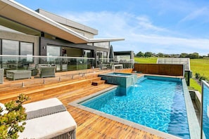 Relax in the spa or on the huge decking