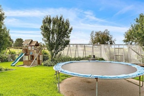 The kids will love the cubby and trampoline