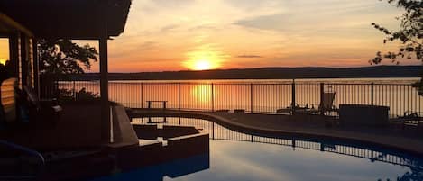 Scenic sunset by the pool.