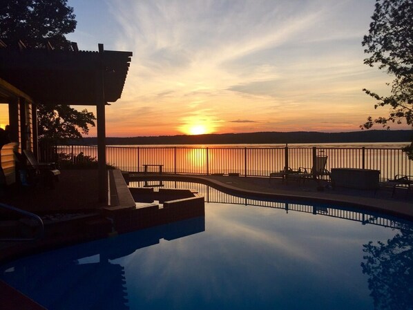 Scenic sunset by the pool.