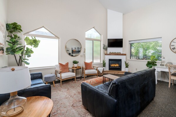 Dreamy in a big, lovely way including gas fireplace, ceiling fan & cozy throws 