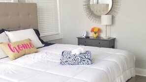 First Bedroom featuring King Sized Bed & Large Smart TV