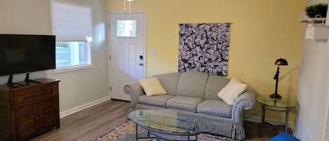 Living room view from the kitchen. Sofa Queen size sleeper sofa 