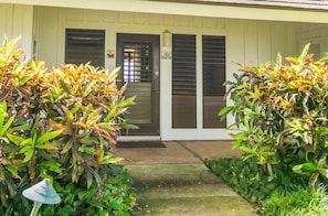 Your best tropical vacation awaits behind this plantation door