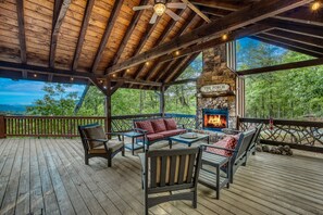 Covered front porch with wood burning fireplace