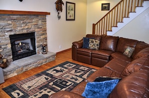 Get cozy by this gas fireplace in the living area