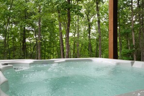 Soak in the hot tub after a day of hiking or ziplining around Blue Ridge