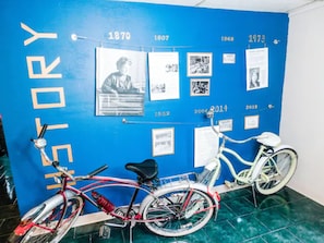 Our buildings history wall and bikes