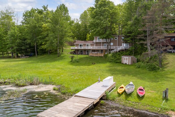 A Southward look from the lake to the home.