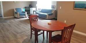 Dining and Living Area  - Sofa is Queen Size pull-out bed - Cottage A