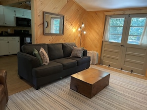 Cozy living area with sleeper sofa.