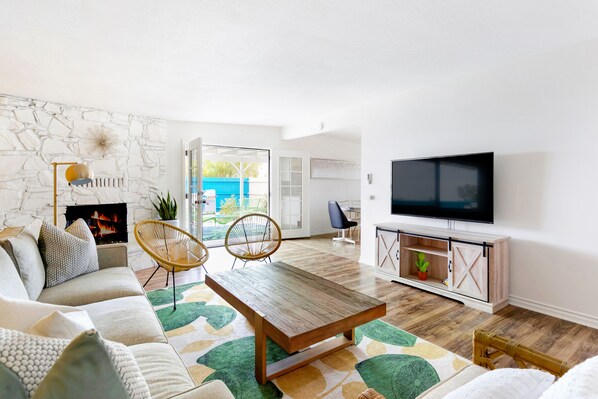 Living room with french doors to the backyard 