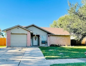 Garage can hold one car, 2-3 cars can be accommodated on the driveway.