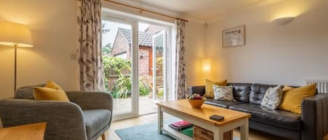 Rowan Cottage: The french doors open out into the courtyard garden