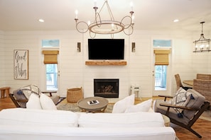 - A charming blend of rustic and coastal, this space welcomes comfort and connection - From board games to movie marathons, there’s room to unwind and enjoy - Perfect heart of the home for relaxing after beach days or exploring town