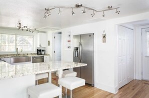 Remodeled kitchen with island seating