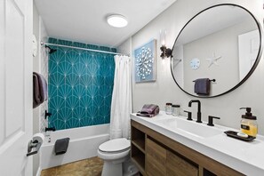 Recently renovated hall bathroom. 