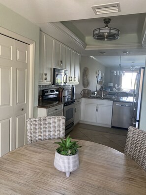 Breakfast table to kitchen.