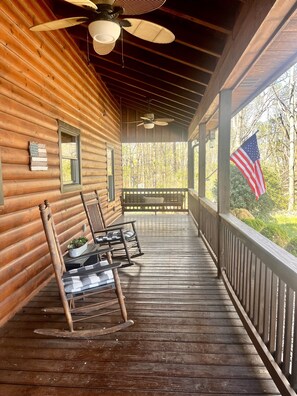 Porch swing and rocking chairs for relaxing.  