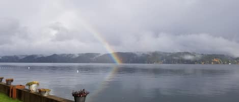 Amazing rainbows over hood canal right off the beach.