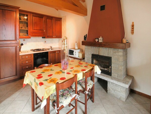 Cabinetry, Furniture, Property, Countertop, Table, Wood, Orange, Interior Design, Kitchen Appliance, Flooring