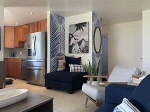 Additional seating and kitchen.