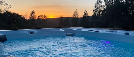 Hot Tub with sunset view.