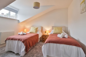 Sleep in a Dorma.  A Large Double Bedroom with 2 Single Beds and USB sockets