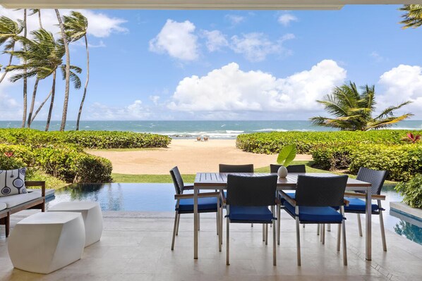 The patio runs the length of the Villa, alongside the pool.