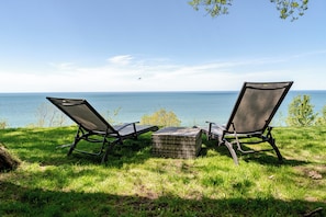 Two chaise lounges overlooking one of the best views in MI