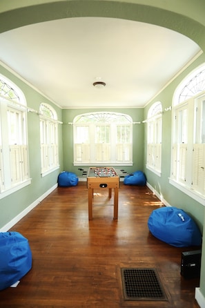 Sun Room with foosball table, bean bags, a great place to relax and play