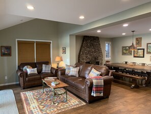 All leather seating in conversation area in great room of main house.