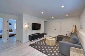 Cozy family room with a comfortable sofa and TV with cable—perfect for movie nights and relaxing