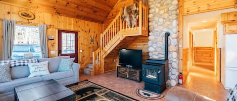 Easy to use pellet stove/fireplace and stone chimney make for a cozy setting.