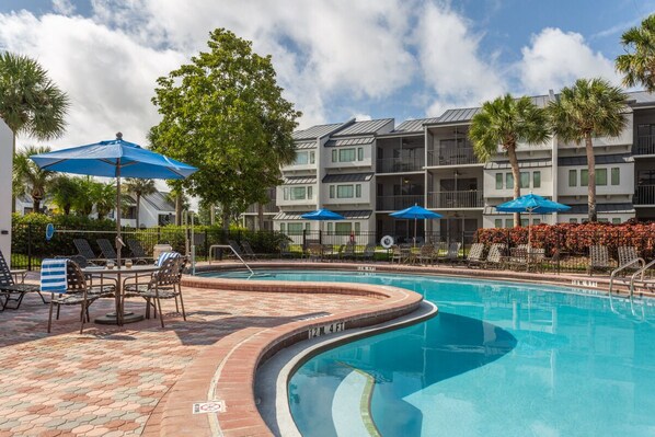 Swimming Pool with Umbrellas and loungers are provided