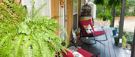 Relax on the front porch & watch the wildlife that roam freely in the resort.