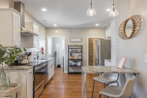 Prepare a delicious meal in the spacious kitchen