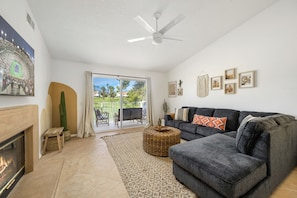 Cozy living room with large sectional couch for everyone to lounge