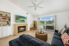 Living room with great views.
*Fireplace and flooring updated since photo*