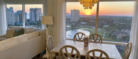 Stunning sunset views of the Gulf and Baytowne hole 14 from living/dining room.
