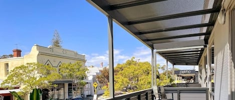 Balcony overlooking all the cafes