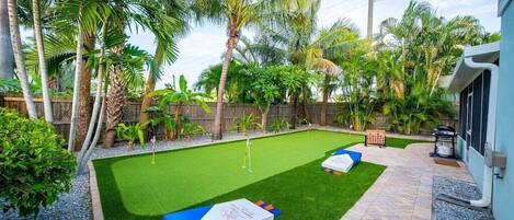Private putting green at Sunny Lane Beach House
