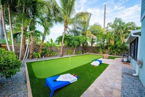 Private putting green at Sunny Lane Beach House