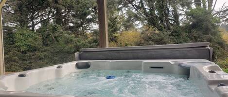 Relax in our six-person hot tub 