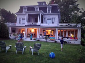 The house at dusk with some of the front yard included in pic 