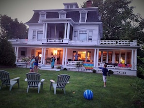 The house at dusk with some of the front yard included in pic 