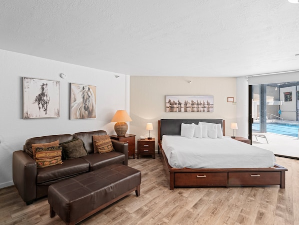 Living Area / King Bed / Pool Deck