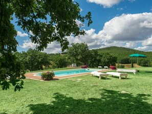 Cloud, Sky, Plant, Building, Natural Landscape, Tree, Shade, Land Lot, Outdoor Furniture, Grass