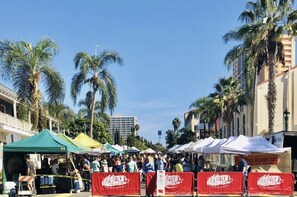 Little Italy neighborhood farmers market three blocks from our property