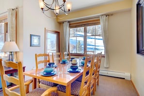 Main dining with seating for 8 including amazing ski views!